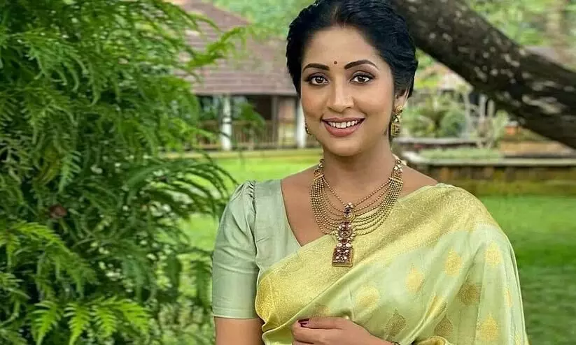 Actress Navaya nair Lock Facebook Comment Box