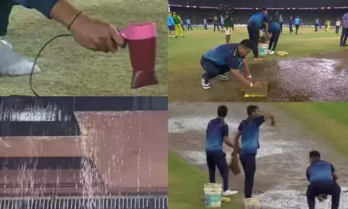 ചോർന്നൊലിക്കുന്ന മേൽക്കൂര, വെള്ളമൊപ്പിയെടുക്കാൻ സ്​പോഞ്ചും പെയ്ന്റ് ബക്കറ്റും; നാണംകെടുത്തി ലോകത്തെ ഏറ്റവും വലിയ സ്റ്റേഡിയത്തിലെ കാഴ്ചകൾ