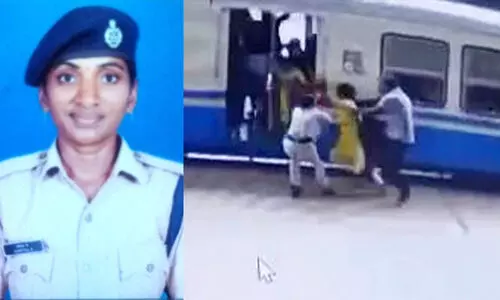 woman constable saves the life of a woman passenger