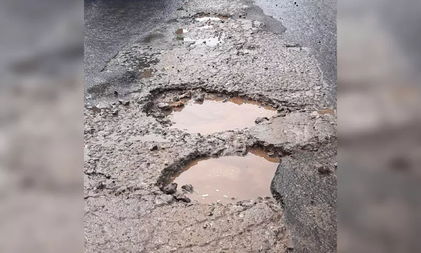 potholes on the road potholes on the road