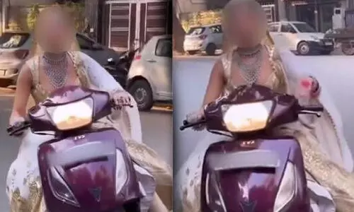 വിവാഹ വസ്ത്രമണിഞ്ഞ് സ്കൂട്ടറില്‍ ഹെൽമറ്റില്ലാതെ റീല്‍സ് ചെയ്യാനിറങ്ങി യുവതി; പണികൊടുത്ത് പൊലീസ്