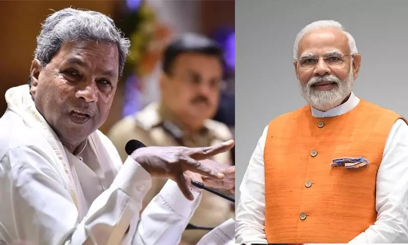 മോദി കന്നഡിഗരുടെ അന്നം മുടക്കുന്നെന്ന് സിദ്ധരാമയ്യ; ‘അന്ന ഭാഗ്യ’ യോജനക്ക് കേന്ദ്രം തുരങ്കംവയ്ക്കുന്നു മോദി കന്നഡിഗരുടെ അന്നം മുടക്കുന്നെന്ന് സിദ്ധരാമയ്യ; ‘അന്ന ഭാഗ്യ’ യോജനക്ക് കേന്ദ്രം തുരങ്കംവയ്ക്കുന്നു