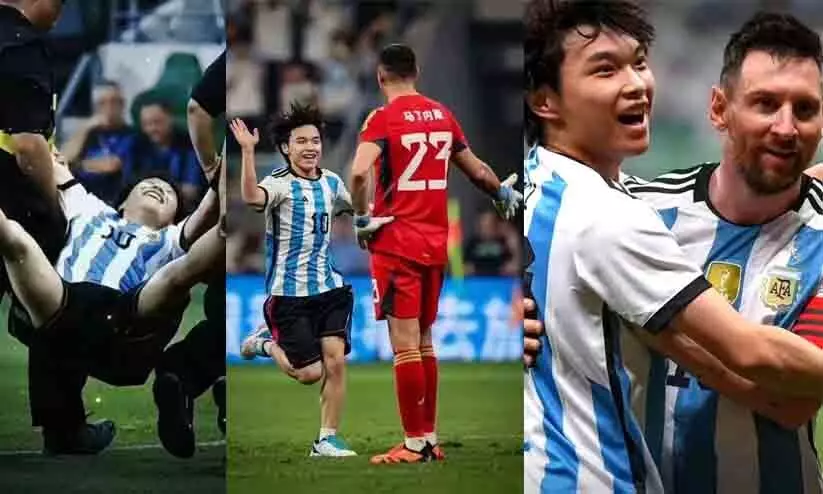 Messi hugged by fan Messi hugged by fan