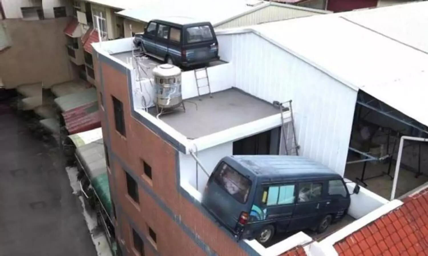 Man Parks His Vans On Roof To Avoid Fine; No, We Are Not Joking