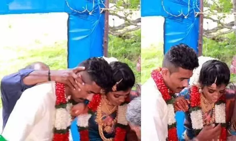 വധൂവരന്മാരുടെ തല കൂട്ടിമുട്ടിച്ച സംഭവം; കേസെടുത്ത്​ പൊലീസ്​