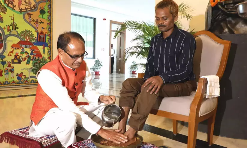 Shivraj Singh Chouhan washes feet of urination incident victim