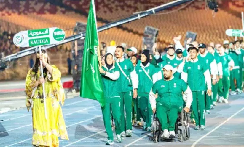 അൽജീരിയയിൽ നടക്കുന്ന 15ാമത് അറബ് ഗെയിംസിനോടനുബന്ധിച്ച് സൗദി ടീമിെൻറ പരേഡ് അൽജീരിയയിൽ നടക്കുന്ന 15ാമത് അറബ് ഗെയിംസിനോടനുബന്ധിച്ച് സൗദി ടീമിെൻറ പരേഡ്