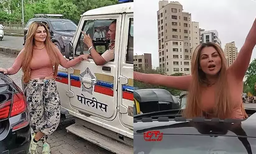 Rakhi Sawant hangs out of the sunroof Rakhi Sawant hangs out of the sunroof