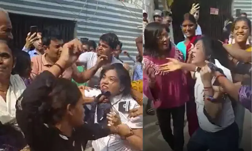 പത്തുവയസ്സുകാരിയെ വീട്ടുജോലിക്ക് നിർത്തി ക്രൂര മർദനം; പൈലറ്റിനെയും ഭർത്താവിനെയും വളഞ്ഞിട്ട് തല്ലി ജനക്കൂട്ടം -Video പത്തുവയസ്സുകാരിയെ വീട്ടുജോലിക്ക് നിർത്തി ക്രൂര മർദനം; പൈലറ്റിനെയും ഭർത്താവിനെയും വളഞ്ഞിട്ട് തല്ലി ജനക്കൂട്ടം -Video