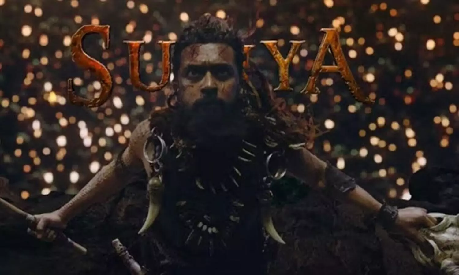 Kanguva first glimpse: Suriya sports long hair as a fierce warrior;