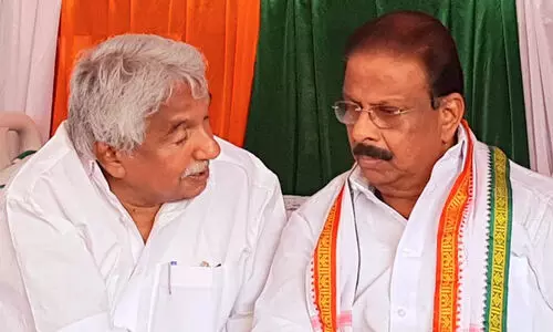 Oommen Chandy, K Sudhakara