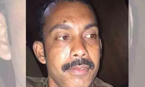 A young man died after falling from a bike in Kozhikode