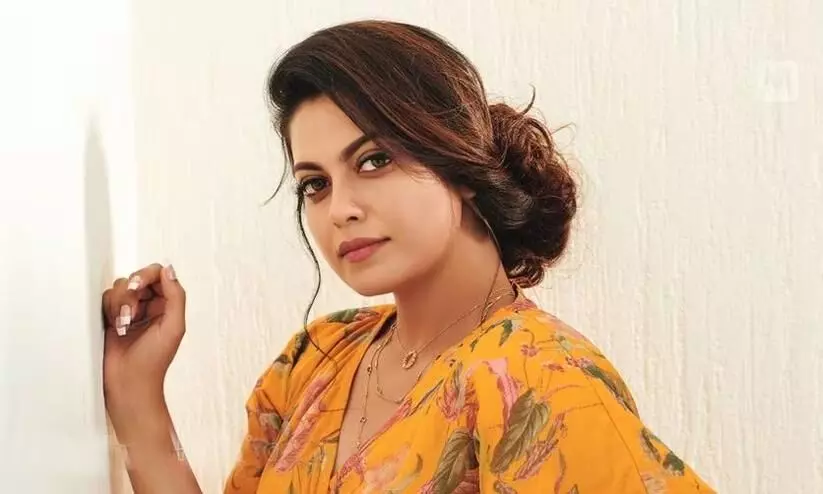 actress anusrees car hit on a bike two injured