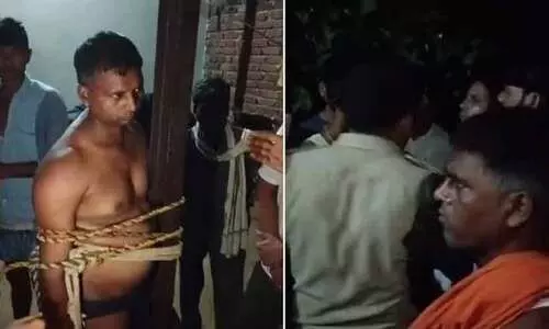 യു.പിയിൽ വീട്ടിൽ അതിക്രമിച്ച് കയറി പെൺകുട്ടിയെ ബലാത്സംഗം ചെയ്യാൻ ശ്രമം; പൊലീസുകാരനെ ആൾക്കൂട്ടം നഗ്നനാക്കി കെട്ടിയിട്ട് മർദിച്ചു