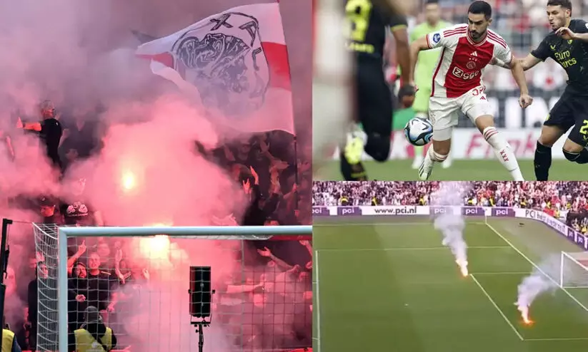 പടക്കമേറ്, ഗ്രൗണ്ട് കൈയേറ്റം; അയാക്സ് ആരാധകർ നിയന്ത്രണം വിട്ടു, മത്സരം ഉപേക്ഷിച്ചു പടക്കമേറ്, ഗ്രൗണ്ട് കൈയേറ്റം; അയാക്സ് ആരാധകർ നിയന്ത്രണം വിട്ടു, മത്സരം ഉപേക്ഷിച്ചു