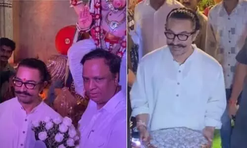 Aamir Khan visits Mumbai BJP presidents house for Ganpati darshan with sweets