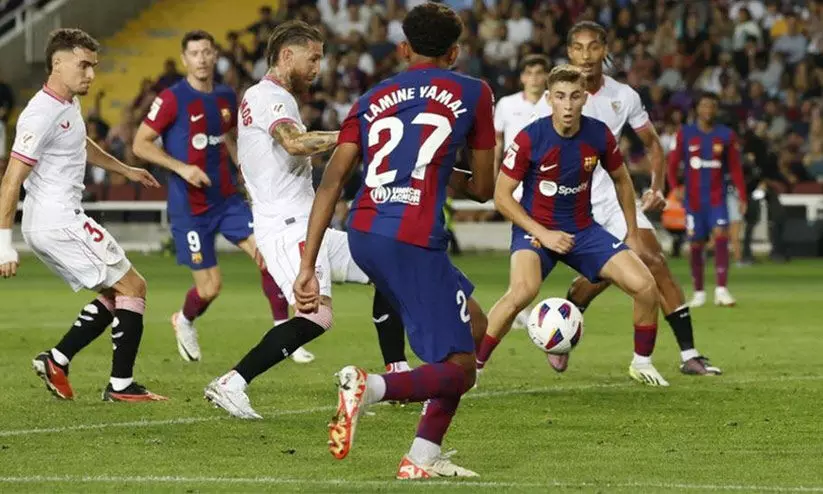 സെവിയ്യക്ക് തിരിച്ചടിയായി റാമോസിന്റെ സെൽഫ് ഗോൾ; ജയത്തോടെ ബാഴ്സ വീണ്ടും മുന്നിൽ സെവിയ്യക്ക് തിരിച്ചടിയായി റാമോസിന്റെ സെൽഫ് ഗോൾ; ജയത്തോടെ ബാഴ്സ വീണ്ടും മുന്നിൽ