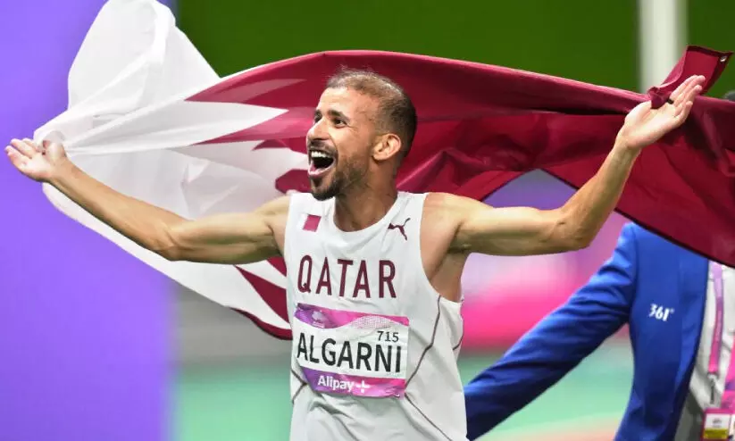Qatar Athlete Muhammed Al Galni Celebrating his gold medal on 1500 Meter Athletics