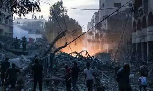 Gaza journalist and father amid Israel bombing