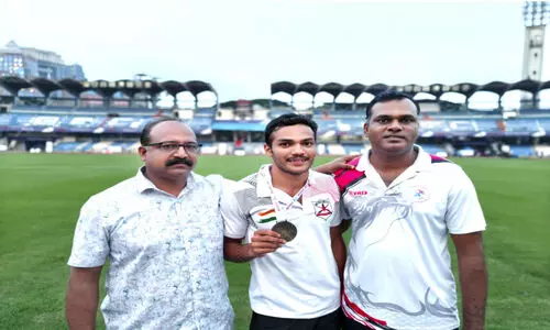 Manikanda With Medal