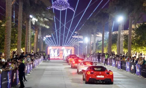 Parade of Excellence in vehicles on Lucille Boulevard