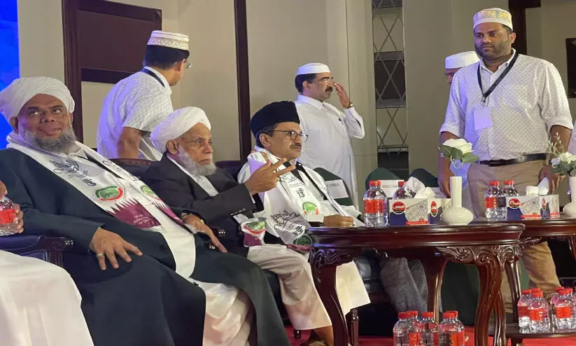 Geoffrey and Sadiqali at the Sadat Association in Doha During the Program