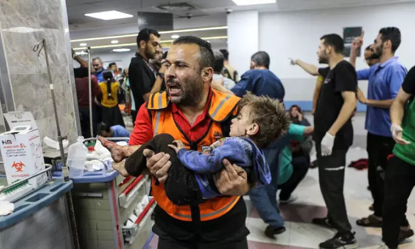 ചോരക്കളമായി അൽ അഹ്ലി ആശുപത്രി; ചിന്നിച്ചിതറിയ മൃതദേഹങ്ങൾ, മുറിവേറ്റ് കുഞ്ഞുങ്ങൾ ചോരക്കളമായി അൽ അഹ്ലി ആശുപത്രി; ചിന്നിച്ചിതറിയ മൃതദേഹങ്ങൾ, മുറിവേറ്റ് കുഞ്ഞുങ്ങൾ