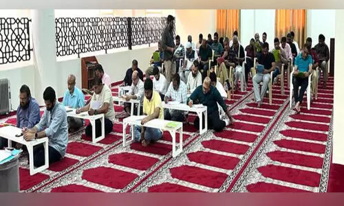 Exam writers at Salmiya Masjid Al Nimsh