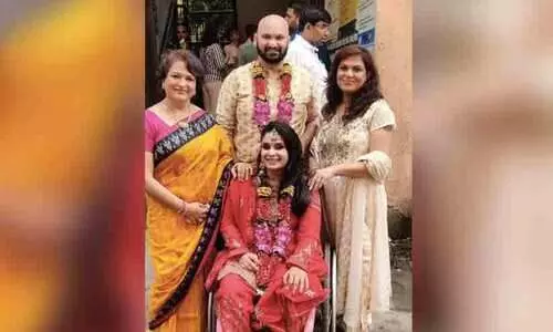 Officer tells woman on wheelchair to go to his 2nd floor office suspended