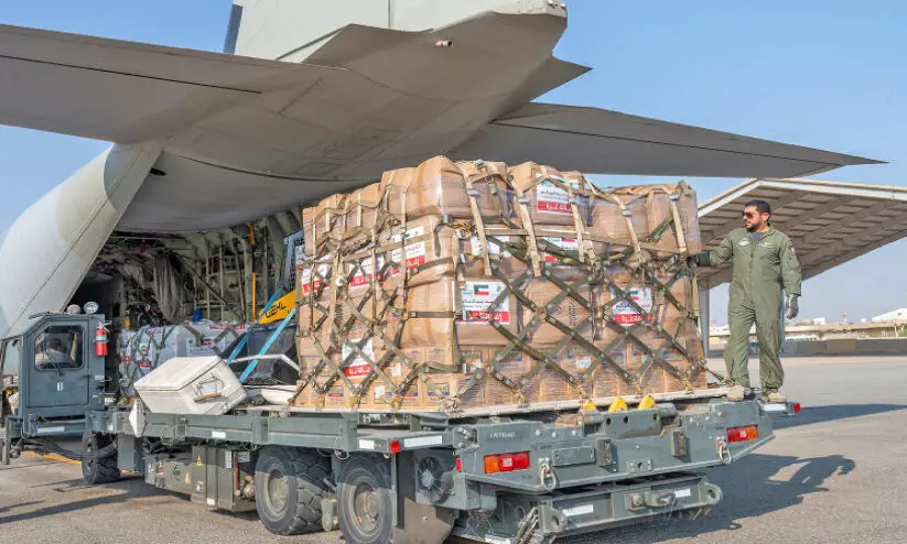 Aids are loaded onto the aircraft