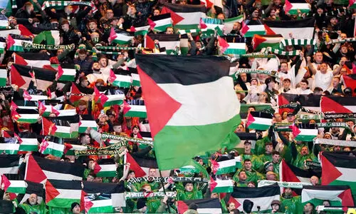 Celtic FC fans with Palestine flag Celtic FC fans with Palestine flag
