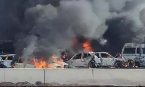 35 killed in vehicle collision, fire