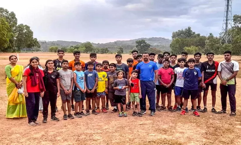 Sports teacher with students of Anser Style Academy