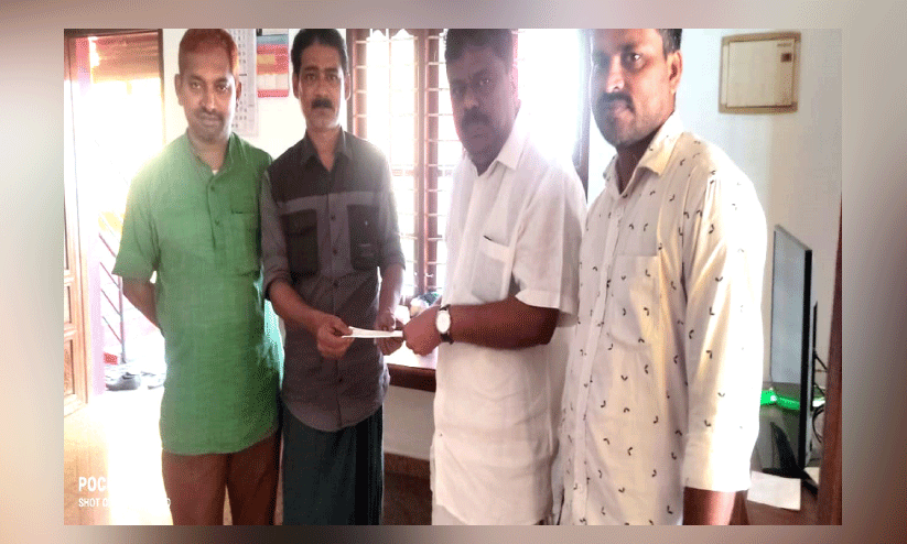 ഗ്ലോ​ബ​ൽ കെ.​എം.​സി.​സി എ​റ​ണാ​കു​ളം ചി​കി​ത്സാ​സ​ഹാ​യം കൈ​മാ​റി