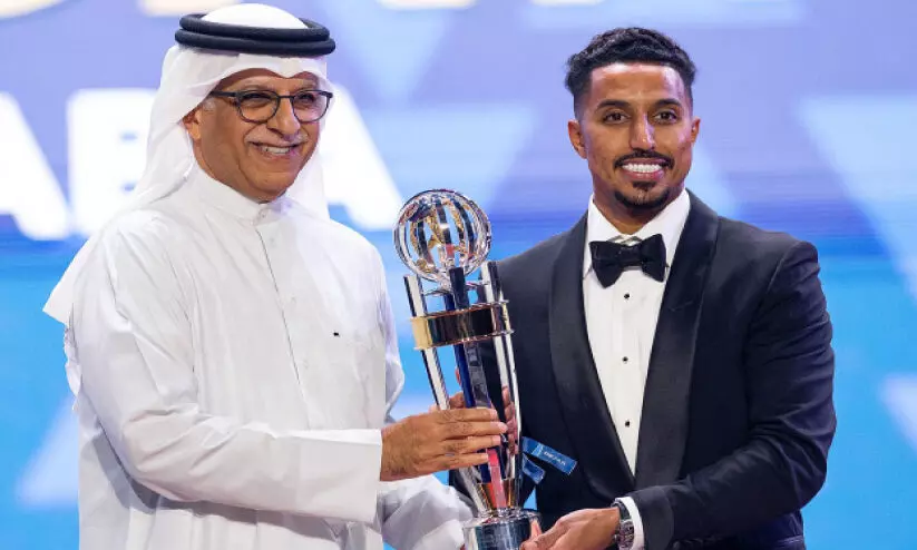 Salim Al Dawsari was awarded by the AFC President  Presented by Sheikh Salman