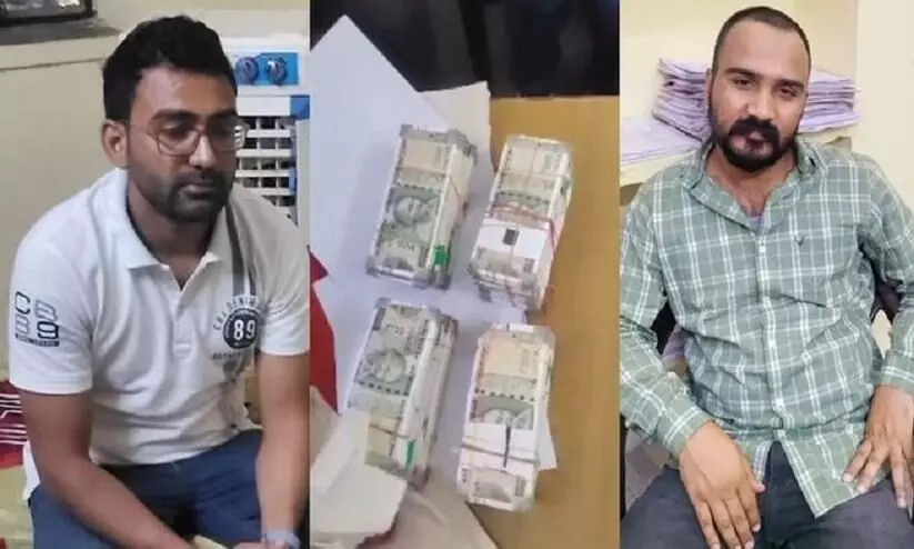 Two ED Officers Caught Red-Handed While Taking Bribe Two ED Officers Caught Red-Handed While Taking Bribe