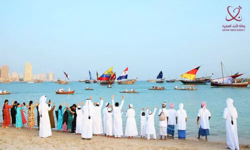 Qatar Dhow Fest 2022 with national flags of World Cup
