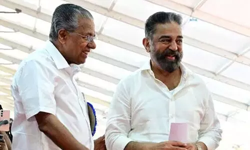 Kamal with Pinarayi