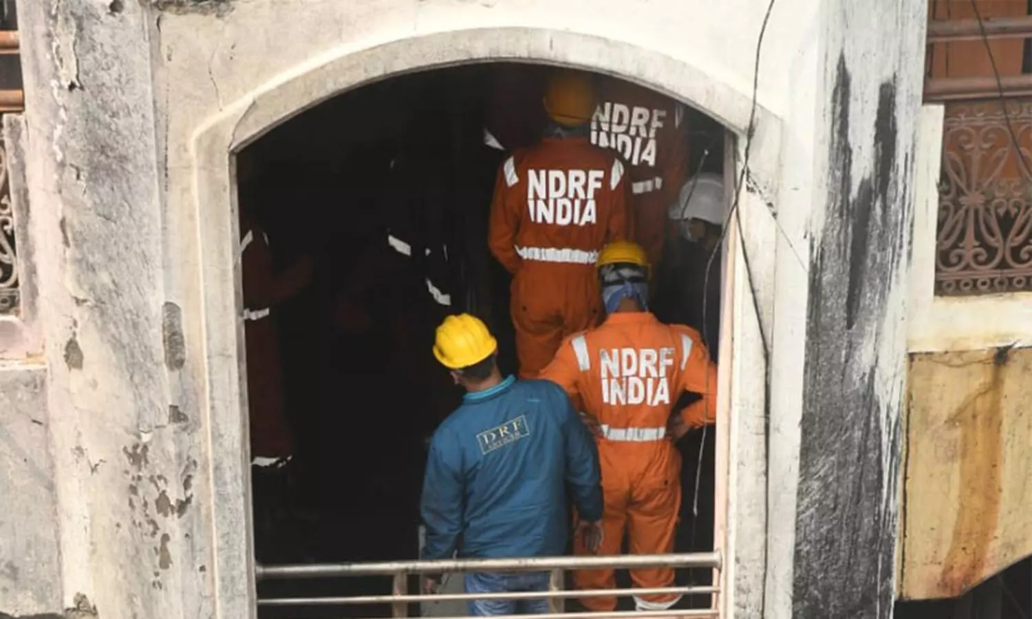 Fire fighters involved in rescue operation at Bazaar Guard, Nampally on Monday morning