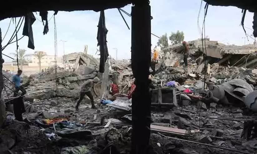 വെടിനിർത്തലിന് അരികെയായിട്ടും വെടിയൊച്ചകൾ നിലക്കാതെ ഗസ്സ വെടിനിർത്തലിന് അരികെയായിട്ടും വെടിയൊച്ചകൾ നിലക്കാതെ ഗസ്സ