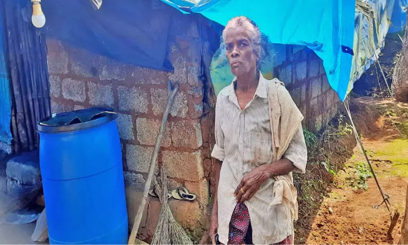 Mallika In front Of her home