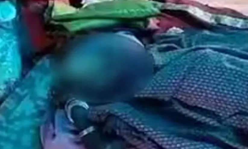 In the tribal village of Malakappara the old man is lying in bed