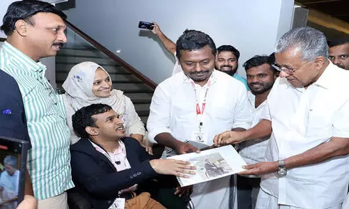 Kondotti Pullikal native Amal Iqbal with Chief Minister Pinarayi Vijayan