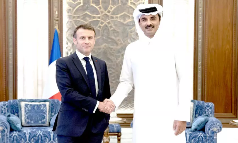 Receiving French President Emmanuel Macron in Doha