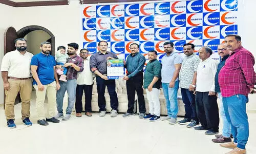 Hail KMCC New Year Calendar Acting President Basheer Mala is publishing