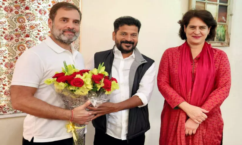 Revanth Reddy in Delhi along with Congress leaders Rahul Gandhi and Priyanka Gandhi