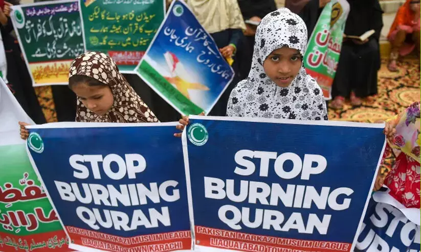 burning Quran burning Quran