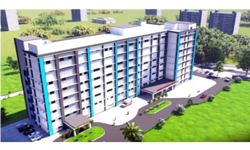 മരത്തിൽ കുരുങ്ങി കോട്ടയം ജില്ല ആശുപത്രി കെട്ടിട നിർമാണം