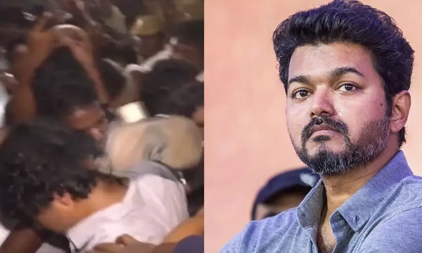 Video! Mystery man throws a slipper on Vijay at Vijayakanths funeral