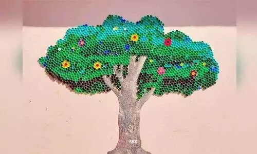 കൗതുകമായി ബോട്ടിൽ ക്യാപ് മരം